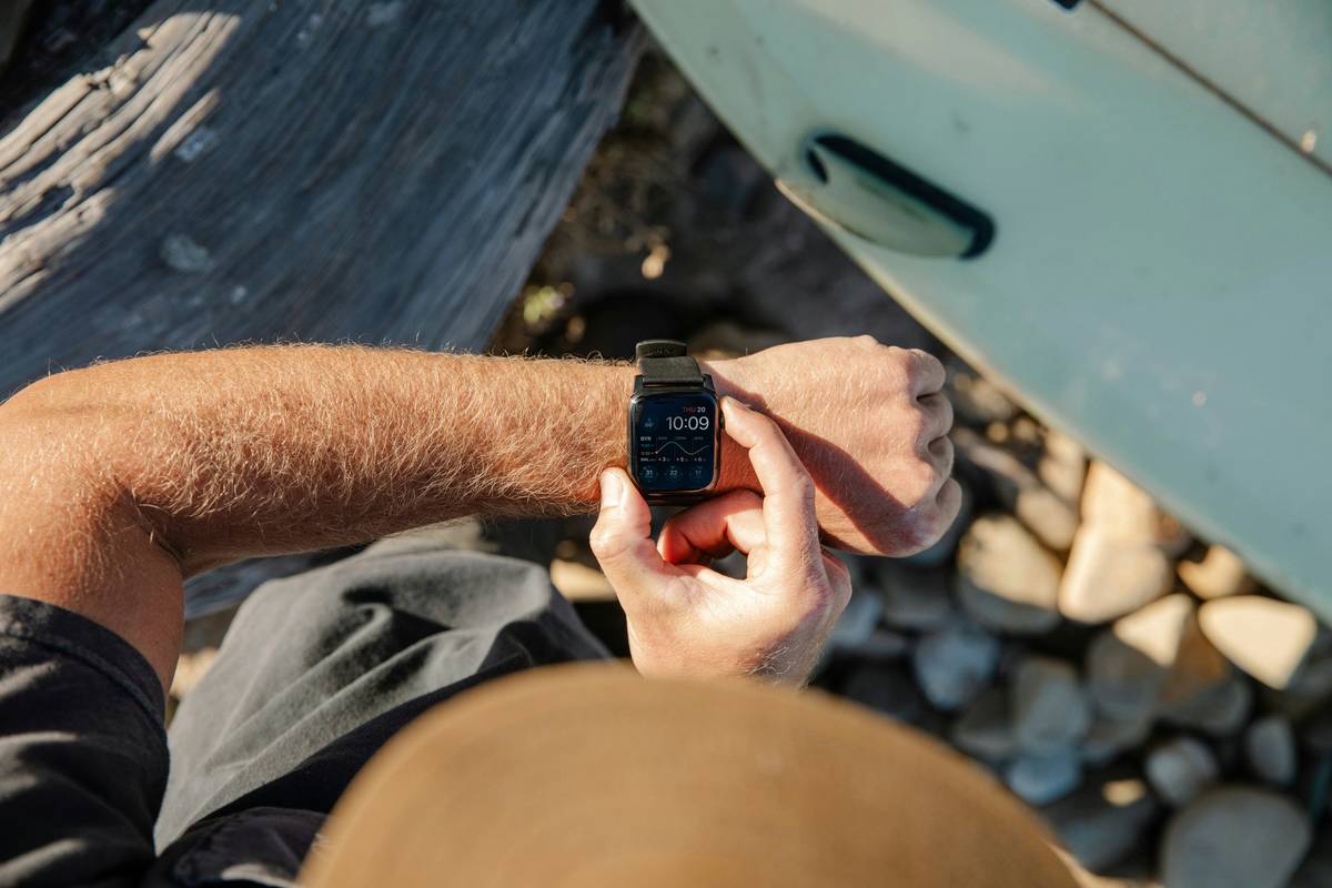 Close-up of wearable devices showing different altitude readings illustrating watch altimeter consistency across brands issue